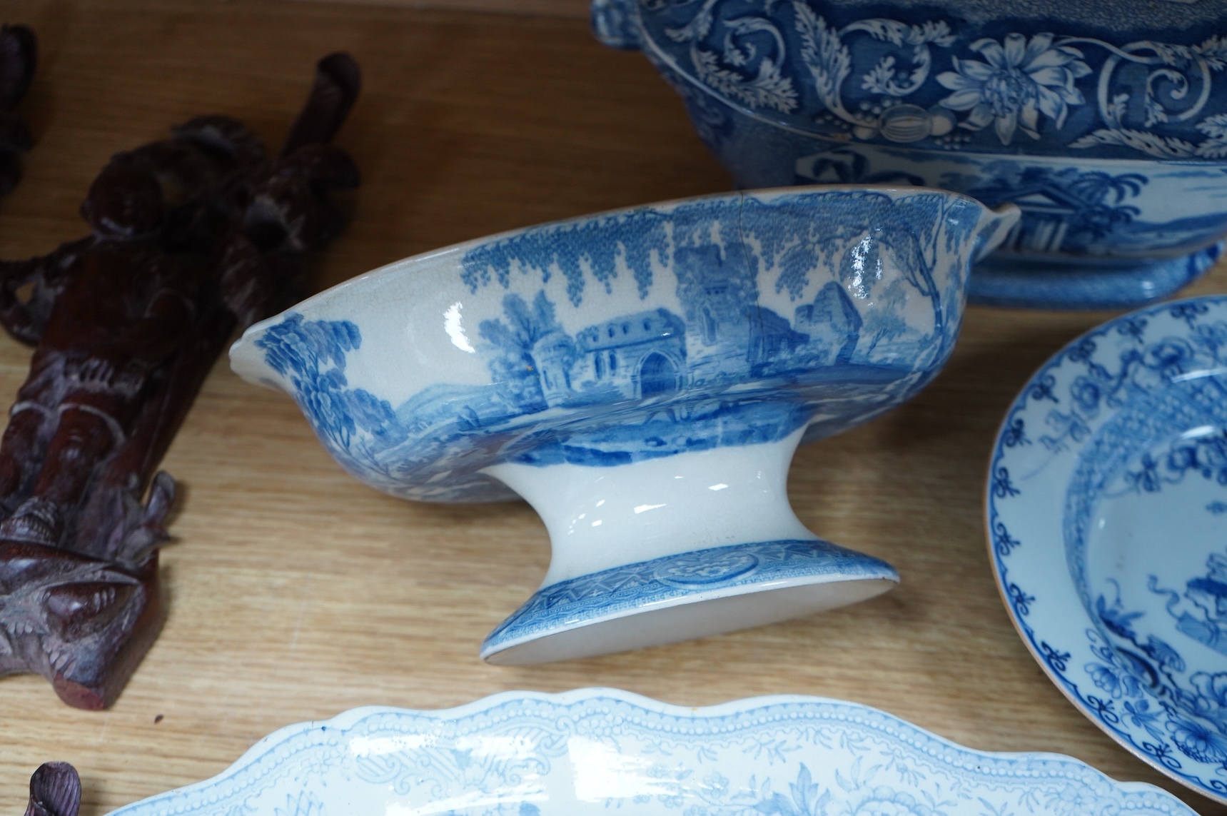 A group of Victorian blue-printed dinner wares, including a Chinese blue and white dish and a Wade bird (13).